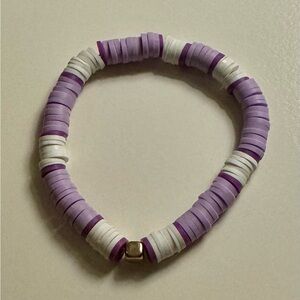 Purple and white bracelet